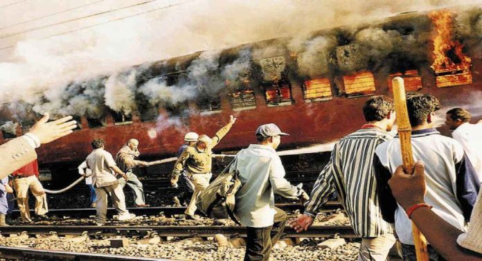 gujarat court acquits 22 accused in post godhra riots case